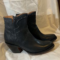 Lucchese “Karla” In Black Cowhide Ankle Boot. Brand New In Box With Tags And Bag. Never Worn Except In Store. Stunning And Classic Boot. Timeless Addition To Any Wardrobe. Leather Booties With Stacked Heel And Snip Toe, Western Ankle-high Heeled Boots With Reinforced Heel, Ankle-high Heeled Boots With Leather Sole, Western Leather Snip Toe Booties, Western Leather Booties With Snip Toe, Leather High Heel Moto Boots, Western Black Boots With Heel Pull Tab, Western Style Black Boots With Heel Pull Tab, Western Leather Booties With Almond Toe