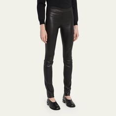 The Row moto stretch leather leggings Approx. measurements: 31" inseam, 40" outseam Natural rise; banded waist Skinny legs with seam detail Pull on style Lambskin bonded to cotton/spandex Dry clean Made in USA of imported material Modern Fitted Leggings For Fall, Fitted Modern Leggings For Fall, High Stretch Leather Leggings For Fall, Fitted Leather Leggings, Sleek Fitted Leather Leggings, Stretch Leather Leggings For Work, Sleek Leather Leggings For Fall, Sleek High Stretch Leather Pants For Winter, Sleek High Stretch Full Length Leather Pants