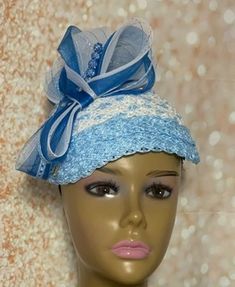 Beautifully created blue and white half hat. Trimmed with a hat pin, blue and white braid, rhinestones, and crinoline bows. Guaranteed to have heads turning. Church hat or for any special occasion. The hat pin may vary and is for decorative purposes only. The hat is affixed to the head via a hat string. The hat measures approximately 10.5 in X 7.5 inches. Handmade gifts for mom, sister, wife, or yourself. Sinamay Hats, Hat Fascinator, Church Hat, Sister Wife, Church Hats, Hat Pin, Tea Parties, Etsy Business, Hat Pins