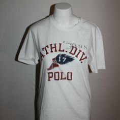 Polo Ralph Lauren Crew Short Sleeve T-Shirt W/ "Athl. Div." White Size Small White Athleisure T-shirt For Sports Season, White Graphic Print Sports Top, Sporty White Tops With Text Print, White Logo Print T-shirt For Sports Season, Red Athleisure Top With Logo Print, Sporty White T-shirt For College, Sporty White Print Short Sleeve Top, White Moisture-wicking College Tops, White Moisture-wicking Tops For College