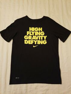 Nike The Tee Black High Flying Gravity Defying Short Sleeve T-Shirt Boys  Size XL Excellent Condition, lightly worn! SEE PICS!! Nike T-shirt With Text Print And Crew Neck, Nike Graphic Tee With Letter Print, Nike Crew Neck T-shirt With Letter Print, Nike Letter Print Crew Neck T-shirt, Nike Graphic Tee With Text Print, Nike Text Print T-shirt For Streetwear, Nike Black T-shirt With Letter Print, Black Nike T-shirt With Letter Print, Nike Graphic Tee