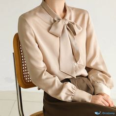 OrcaJump - Classy Bow-Adorned Chiffon Blouse with Luxurious Texture Chiffon Long Sleeve Office Blouse, Fall Office Blouse In Chiffon, Fall Office Chiffon Blouse, Elegant Beige Blouse For Office, Elegant Beige Office Blouse, Elegant Solid Chiffon Blouse, Formal Fitted Chiffon Tops, Formal Chiffon Tops For Fall, Solid Chiffon Blouse For Office