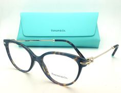 Brand New %100% Authentic %100% TIFFANY&CO.  Eyeglasses Model: TF 2217 Color: 8015 Size: 53-17 140 Description: Classic Tortoise Cat-Eye style plastic frame with decorative gold metal temples with Tiffany Logos on the sides. It comes with demo lenses but these frames can be customized to your prescription for an additional fee (Please email us for more information)   Includes: Eyeglasses pictured and TIFFANY&Co. soft pouch ONLY. (Case and packaging may vary from pictures). All OUR PRODUCTS ARE 1 Unique Glasses Frames, Tiffany Eyeglasses, Tortoise Cat, Gold Frames, Tiffany And Co, Glasses Frames, Reading Glasses, Tiffany & Co., Gold Frame