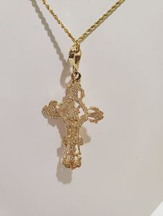 "You are viewing a beautiful 24k.solid gold Jesus cross pendant. The pendant total weight approx. 3.64 grams. NOTE : CHAIN NOT INCLUDED The pendant measures approx.1 3/4 inches tall x 7 /8 inches wide.. The cross marked 14k at the back. The cross pendant is nicely carved with Jesus on the cross , diamond cut style so its spark in any angle as you wear it. Please take a closer at the video and photos. When listing and describing our items we make a conscious effort to over describe all imperfecti Yellow Gold Plated Cross Pendant Necklace, Gold Plated Yellow Gold Crucifix Necklace, Yellow Gold Plated Crucifix Cross Necklace, Gold-plated Yellow Gold Crucifix Necklace, Yellow Gold Crucifix Cross Necklace, Gold Plated, Gold Filigree Crucifix Jewelry, Gold Plated Spiritual Cross Jewelry And Charms, Gold Hallmarked Crucifix Charm, Yellow Gold Hallmarked Crucifix Cross Necklace