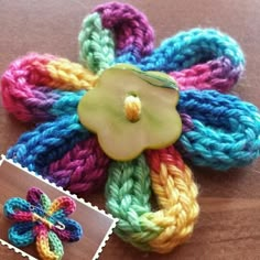 a crocheted flower with a button attached to it