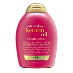 Indulge, fortify & strengthen your tresses with OGX Anti-Breakage + Keratin Oil Conditioner. This damage repair conditioner helps resist breakage caused by brushing and styling as it strengthens split ends. Designed to reduce fizz, the fortifying conditioner also helps increase elasticity so you can maintain longer, stronger locks with a luminescent shine. The nourishing damage-repair blend is fortified with smoothing and conditioning argan oil in addition to keratin proteins, which help fortify Conditioner For Dry Damaged Hair, Conditioner For Damaged Hair, Hair Split Ends, Keratin Oil, Keratin Smoothing, Dry Damaged Hair, Anti Frizz Products, Strong Hair, Split Ends