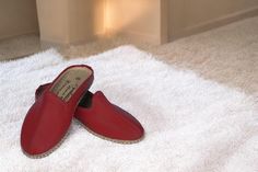 Flat 100% handcrafted stylish house shoes. These flat genuine leather claret red color half slippers will be a great authentic gift for your family, friends and of course for yourself. Our traditional  shoes are suitable for wearing inside or / and outside.  100% Handcrafted and made by genuine leather. Optionally, 2 mm rubber outsole can be attached which is useful for slippery surfaces. Moreover, having heel on this slippers is possible (0.6 cm). Kindly check the drop-box menu. Wanna see more Red Flat Slip-ons With Leather Sole, Leather Slip-on Clogs With Red Sole, Red Round Toe Slippers For Indoor Use, Red Closed Toe Slip-ons With Leather Sole, Red Slip-on Mules With Rubber Sole, Red Slip-on Mules With Leather Footbed, Red Slip-on Slippers With Rubber Sole, Leather Mules For Indoor Use With Round Toe, Red Slip-on Slippers