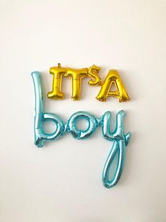 it's a boy foil balloons in the shape of letters on a white background