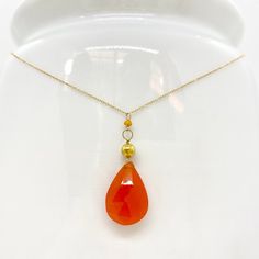 "Wire, Chain & Clasp: 14k Gold Stones: Carnelian Drop (approx. 18mm), Carnelian Bead (approx. 1mm x 2mm), 18k Gold Nugget (approx. 4mm) Necklace Length: approx. 17\" Backdrop: Freshwater Pearl & Tsavorite Backdrop Length: 1.75\" ------------------------------------------------------------ Let me know if you have any questions! *Size adjustable at client's request" Gold Chalcedony Jewelry As A Gift, Yellow Gold Chalcedony Gemstone Necklace, Fine Jewelry In Yellow Gold With Chalcedony, Yellow Gold Chalcedony Jewelry Gift, Faceted Briolette Yellow Gold Jewelry, Yellow Gold Chalcedony Necklace As Gift, Formal Yellow Gold Chalcedony Jewelry, Gold Chalcedony Gemstone Beads Necklace, Gold Chalcedony Necklace With Gemstone Beads