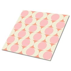 an orange and pink polka dot pattern on a white background