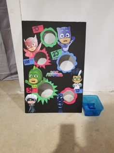 a cardboard box that has various stickers on the front and sides of it, including masks