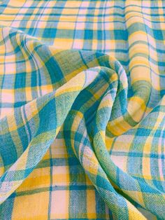 a blue and yellow plaid fabric