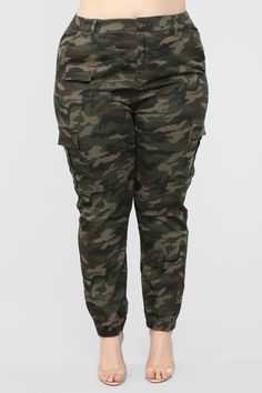 Available in Camouflage Camo Print Fabirc Knit Fabric Full Stretch Oversized Fit Elastic Waistband Front Closure 6 Pocket Detail Elastic Cuff Ankle High Waisted - Cargo Pants - Camo Pants - Camouflage Pants 27.5 inseam. Based on a size Small Disclaimer: Print Placement Will Vary 98% Cotton 2% Spandex Imported | Cadet Kylie Camp Pants in Camo size 1X by Fashion Nova Cheap Utility Camouflage Bottoms, Camo Pants Fashion, Army Pants Outfit, Womens Camo Pants, Camp Pants, High Waisted Cargo Pants, Camouflage Fashion, Army Pants, Camouflage Pants