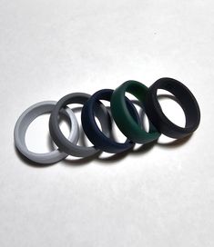 8mm Silicone rubber wedding ring / band. 8mm width with thicker band - ideal for men Available in size 7 to 14 Ideal ring for active lifestyles  As silicone is flexible and moulds to any shape - they can make an ideal ring for active lifestyle or someone who does a lot of work with there hand. Want to keep your normal wedding band safe when you workout or go swimming - but don't want to go out without a ring Worried about bending or catching your ring on machinery - no issues with a silicon ring Ring Band For Men, Silicon Ring, Rubber Rings Wedding, Silicone Rings, Wolfram, Minerals And Gemstones, Wood Rings, Ring Band, Active Lifestyle