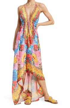 Unleash your free boho spirit in this longline halter cover-up dress styled with vivid allover blooms and tassel accents. Halter neck Tassel accents Tie closure All-over print Woven 100% polyester Hand wash cold, line dry Imported Model stats: 5'10", 32" bust, 25" waist, 36" hip. Model is wearing size S. Multicolor Maxi Dress For Spring Festival, Spring Festival Multicolor Maxi Dress, Multicolor Beach Dress For Spring Festival, Bohemian Multicolor Maxi Dress With Tassels, Hippie Maxi Dress With Tassels For Summer, Bohemian Multicolor Print Maxi Dress For Beach, Spring Beachwear Maxi Dress With Tassels, Spring Hippie Halter Neck Maxi Dress, Bohemian Multicolor Floral Print Beach Dress