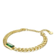 Introducing the You're A Gem Bracelet, a stunning addition to your jewelry collection. Featuring a unique double link bracelet design, this piece exudes sophistication and style. At its center sits a large green stone, adding a pop of color and elegance to any ensemble. Crafted from high-quality 18K gold plated stainless steel, this bracelet is not only durable but also resistant to water and tarnishing, ensuring long-lasting wear. Its hypoallergenic properties make it suitable for even the most Modern Green Bangle Jewelry, Modern Green Gemstone Bracelets, Elegant Green Chain Bracelet, Modern Green Bangle, Green Link Chain Jewelry, Modern Double Chain Bracelet, Green Formal Jewelry Chain, Formal Green Chain Jewelry, Formal Green Jubilee Chain Bracelet