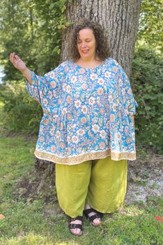 Livi Tunic in 100% Cotton (block-printed cotton) that is perfect for plus size women. Made in USA. Peaches is an online store featuring natural fibers, sizes 1x - 10x. Petite, tall, have a larger belly? We make to order Lagenlook clothing . Our casual plus size lagenlook outfits are comfortable and have style. A quality plus size fashion closet includes cotton and linen outfits. Pants, dresses, skirts, shirts, jackets, we have all. Plus size lagenlook apparel USA. Shown with linen Darcey Pant Bohemian Tunic With Relaxed Fit For Daywear, Bohemian Tunic For Daywear With Relaxed Fit, Bohemian Relaxed Fit Tops For Gatherings, Bohemian Blouse With Relaxed Fit And Gathered Sleeves, Bohemian Tops With Gathered Sleeves In Relaxed Fit, Bohemian Tops With Gathered Sleeves And Relaxed Fit, Bohemian Oversized Tops With Pockets, Oversized Bohemian Tunic For Daywear, Lagenlook Tunic Blouse Relaxed Fit