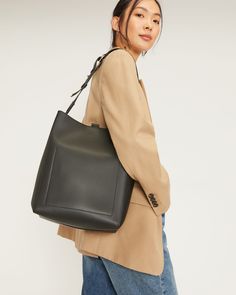 The Studio Bag Black – Everlane Modern Rectangular Bucket Bag For On-the-go, Classic Leather Shoulder Backpack For On-the-go, Versatile On-the-go Tote Shoulder Bag, Chic Square Bucket Bag For On-the-go, Versatile Square Box Bag For On-the-go, Versatile Satchel Hobo Bag For On-the-go, Classic Rectangular Hobo Bag For On-the-go, On-the-go Bucket Bag With Removable Pouch, Classic Square Satchel For On-the-go