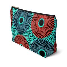 These t-bottom pouches now come in our retro color burst Ankara pattern print, and are great for pretty much anything. They make an fabulous, stylish grab and go bag; pencil case and cosmetic travel bag. Constructed of a durable material with a zipper closure. .: 100% Polyester .: Multiple sizes .: T-bottom 2.5 inches long .: With non-laminated lining Large Width, in 2.88 Length, in 12.29 Height, in 6.93 Diy Clutch Bag, Color Burst, Diy Clutch, Go Bag, African Ankara, Go Bags, Flower Graphic, Wax Print, Travel Cosmetic Bags