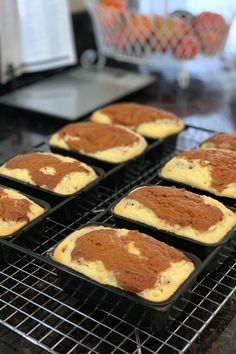 several muffins cooling on a wire rack