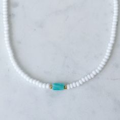 Dainty beaded choker necklace with a turquoise amazonite bar surrounded by small galvanized gold beads. Necklace is about 14 inches with a 2 inch extender. Cheap Turquoise Necklace With Tiny Beads, Gold Beads Necklace, Turks Caicos, Bead Necklaces, Turquoise Bead Necklaces, Bracelet Ideas, Beaded Choker Necklace, Detail Shop, Beaded Choker