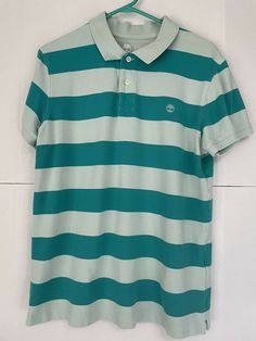 Timberland men’s short sleeve striped polo shirt green size large. Condition is "Pre-owned". Shipped with USPS First Class. Casual Striped Short Sleeve Polo Shirt, Summer Polo Shirt With Horizontal Stripes, Summer Horizontal Stripe Polo Shirt, Casual Short Sleeve Polo Shirt With Horizontal Stripes, Casual Horizontal Stripe Short Sleeve Polo Shirt, Summer Short Sleeve Horizontal Stripe Polo Shirt, Casual Short Sleeve Polo Shirt With Stripes, Casual Short Sleeve Striped Polo Shirt, Green Polo Shirt With Striped Collar And Short Sleeves