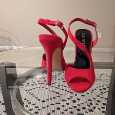 Red Heels New Never Worn Night Out Heels With Red Sole And Open Heel, Red Sole Heels For Night Out With Open Heel, Red High Heels With Heel Strap, Red Heels With Heel Strap For Night Out, Open Heel Heels With Red Sole For Night Out, Red Open Toe Heels For Evening, Red Sandals With Heel Strap For Night Out, Red Open Toe Heels With Wrapped Heel, Red Heels With Wrapped Heel And Ankle Strap