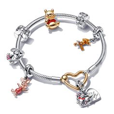 The love, light and pure delight of your best forest friends come together in the most cheerful way. A 14k gold-plated Pandora Moments Heart Closure Snake Chain Bracelet is adorned with the Infinite Hearts Sparkling Clip Charm plus five of the most adorable Pooh-inspired charms: the Disney Winnie the Pooh Tigger Dangle Charm with transparent orange enamel over Tigger's grooved stripes and tail that curls up to form a loop; the Disney Winnie the Pooh Piglet Dangle Charm showing Pooh's best friend Whimsical Gold Charm Bracelet Gift, Gold Whimsical Charm Bracelet Gift, Gold Whimsical Charm Bracelet For Gift, Gold Whimsical Charm Bracelet, Yellow Gold Bracelet With Dangling Charms For Gifts, Gf Gifts, Disney Pandora Bracelet, Disney Charm Bracelet, Pandora Bracelet Charms Ideas