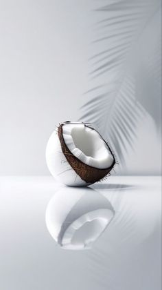 a half eaten coconut sitting on top of a table