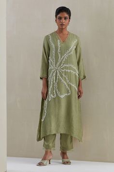 Green kaftan hand embroidered with flower motif, asymmetric hem and sheer scalloped border detailing on neck and cuffs. Paired with a flared pant with sheer border on hem and contrasting line on sides. - Aza Fashions Elegant V-neck Kurta With Floral Embroidery, Spring V-neck Kaftan With Chikankari Embroidery, Spring Chikankari Embroidery V-neck Set, Spring V-neck Chikankari Embroidered Sets, Elegant Floral Embroidered V-neck Kaftan, Spring Linen V-neck Kaftan, Green Straight Kurta Sets With Embroidered Neckline, Spring V-neck Sets With Dupatta, Elegant Straight Kurta Kaftan For Spring