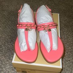 New In Box. Michael Kors Elsa Thong Napa Sandals In A Size 6.5. Grapefruit Color With Gold Hardware. Pink Toe Post Sandals In Synthetic Material, Pink Toe Post Sandals In Synthetic, Pink Synthetic Toe Post Sandals, Pink Sandals With Cushioned Footbed, Pink Leather Toe Post Sandals, Pink Sandals With Ankle Strap And Branded Insole, Pink Synthetic Sandals With Branded Insole, Pink Round Toe T-strap Sandals For Beach, Pink T-strap Sandals With Round Toe For Beach