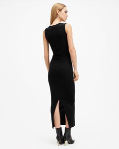 We're throwing it back to the 90s with this simple silhouette. Introducing the Katarina Dress. Crafted from organic cotton with a little bit of stretch to the fabric. The shape never fails - boat neck, sleeveless with detailing at the waist creating a flattering slim fitted look. At maxi length, it's super easy to style with shirts, leather and cardigans on the top (although, it looks just as good by itself - keep it minimal)   This dress is designed to a slim fit Pullover Boat neck Maxi length Spring Midi Dress By Allsaints, Allsaints Summer Midi Dress, Summer Fitted Midi Dress By Allsaints, Chic Fitted Allsaints Midi Dress, Allsaints Spring Midi Dress, Allsaints Fitted Summer Dress, Fitted Allsaints Summer Dress, Allsaints Fitted Midi Dress, Allsaints Fitted Spring Dresses