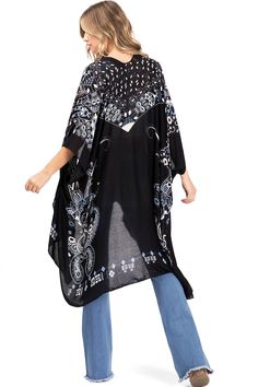 Printed lightweight cardigan, with split on sides and an open front style with an asymmetrical length. Dropped?sleeves and sheer fabric. Looks great layered over casual outfits. CARE | Hand Wash ColdCONTENTS | 100% ViscoseMEASUREMENTS | 38"/96 cm Top to Bottom (Size O/S) MODEL | 5'8 - wearing O/SIMPORTED Chic Spring Layering Cover-up, Oversized V-neck Spring Cover-up, Flowy V-neck Cardigan For The Beach, Summer V-neck Beach Cover-up Outerwear, Casual Open Front Beach Cover-up Outerwear, Casual Black V-neck Kimono, Long Sleeve Summer Layering Cover-up, Casual Oversized V-neck Cover-up, Casual Rayon Kimono For Beach Cover-up