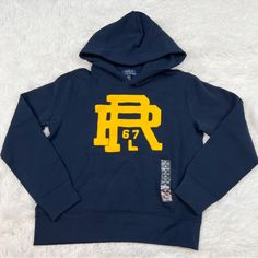 84% Cotton 16% Polyester Pocket Front Navy Hooded Top For Fall, Navy Hoodie For Fall, Blue Logo Print Hoodie For Winter, Blue Fleece Tops With Letter Print, Navy Hooded Top With Letter Print, Blue Fleece Tops With Logo Print, Blue Fleece Sweatshirt With Logo Print, Blue Cotton Hoodie With Logo Print, Blue Fleece Sweatshirt With Logo