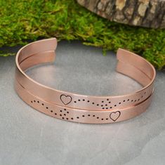 "These bracelets are perfect for you and your bestie! \"Always together, never apart\" is stamped inside the first bracelet. \"Maybe in distance but never in ❤\" is stamped inside the second bracelet. The bracelets measure 1/4\" x 6\" and are adjustable to fit all sizes. The Details *Handcrafted using 1/4\" width aluminum, brass, copper or sterling silver *The font pictured is Caelum, but I'm happy to stamp the bracelets in another font if you'd like. Check out the options here: http://silversta Always Together Never Apart, Jewelry Wax, Always Together, Steel Stamp, Vintage Silverware, Gold Alloys, Brass Copper, Stamped Jewelry, Bangle Set