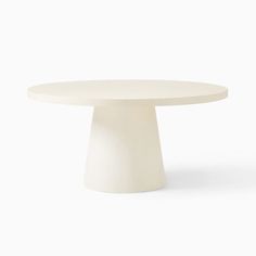 a white round table on a white background with no one around it or someone else