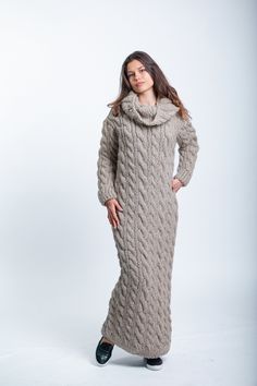 Beige Sweater Dress, Oversized Wool Dress, Extravagant Wool Dress  DETAILS  *Material -Premium Wool Natural Yarn ,100% Eco Yarn ,no colored *100 % Handmade and Homemade locally in Bulgaria /EU / by our own employed knitters. We ensure excellent working conditions- faire paid , free health insurance and 20 days annual paid vacation..     / Made in a smoke-free and pet friendly environment/ *Style - cables *Color - beige     / Product colour may slightly vary due to photographic lighting sources o Cozy Knitted Beige Dresses, Long Chunky Knit Sweater Dress, Hand-knitted Long Sleeve Dress For Fall, Hand Knitted Long Sleeve Dress For Fall, Winter Long Chunky Knit Dress, Cozy Long Knitted Dress, Long Chunky Knit Winter Dress, Oversized Long Knit Dress, Long Oversized Knit Dress