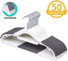 the ultimate set of 50 hangers for clothes is white with black stripes and gray strips