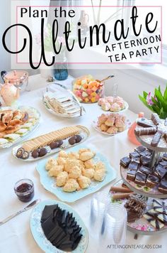 a table filled with different types of desserts and pastries on top of it