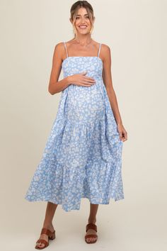 Light Blue Floral Cutout Tie Back Maternity Midi Dress Blue Cotton Maternity Dress, Sleeveless Blue Maxi Dress For Maternity, Blue Tiered Dresses For Daywear, Blue Floral Print Maternity Maxi Dress, Summer Tiered Maternity Dress, Spring Maternity Cotton Dress, Fitted Tiered Maternity Dress, Floral Print Maternity Dress For Beach, Summer Maternity Blue Dresses