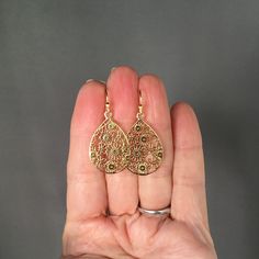 "Beautifully detailed 14k bright gold vermeil filigree teardrop flower charms simply dangle from 18k gold vermeil balled earwires. These lightweight go-with-everything earrings complete any outfit for daytime or evening. Gold flower charms: 19x29mm Total length of earrings: 1 1/2\" All gold is vermeil. A matching necklace is available... www.etsy.com/listing/942764148/gold-flower-pendant-necklace As the owner, maker, designer, and curator of this shop, I take great pride in providing you with je Hypoallergenic Gold Pear-shaped Earrings, Teardrop-shaped Gold Plated Filigree Jewelry, Gold Plated Filigree Teardrop Jewelry, Gold Hypoallergenic Pear-shaped Jewelry, Gold Teardrop Pendant Earrings For Gift, Ornate Drop Earrings For Gifts, Ornate Drop Earrings Gift, Yellow Filigree Jewelry Gift, Gold Drop Pierced Jewelry