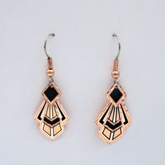 Inspired by the beauty of art and nature, pure copper products are handcrafted jewelry and unique gifts using an exclusive ancient copper craft. All of handmade items are silver plated and individually diamond cut on copper. Each piece has a protective acrylic coating to prevent tarnishing so no polishing is required. Earring wires are hypoallergenic, surgical steel. 99% pure copper jewelry is fine in style and should be handled carefully. Here are the tips that will help you to enjoy your jewelry for many years: * Put on jewelry after dressing and take off first when undressing. * Avoid scratches. * Take off your jewelry while having shower. * Keep away from detergent products. * Keep away from chemicals. * Pay attention on hard surfaces. * Keep it in its own bag. Gold Dangle Jewelry With Artistic Design, Artistic Silver-colored Copper Earrings, Artisan Earrings With Artistic Design As A Gift, Artisan Earrings With Artistic Design For Gift, Artistic Silver Copper Earrings, Handmade Artistic Copper Earrings, Elegant Artistic Drop Earrings Jewelry, Artistic Handmade Copper Earrings, Traditional Rose Gold Earrings For Gift