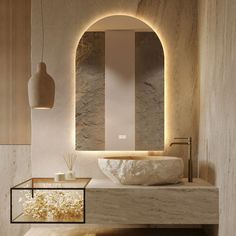 a bathroom with a stone sink and round mirror