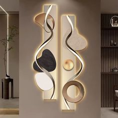 a modern living room with an abstract wall sculpture