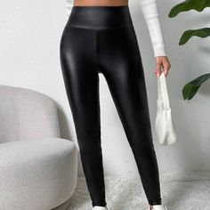 Are you looking for pants that fit right into your everyday look? Then these Women's Solid Thermal Lined Pants are the best bet. The long length and loose fit provide a silhouette, perfect for both lounging at home and stepping out with confidence. The thermal lining adds an extra layer of warmth, ensuring you stay snug and cozy during cooler seasons. Specifications: Thermal-Lined PU Leather: Designed with a thermal lining, these PU leather pants provide both style and warmth, perfect for colder High Stretch Black Bottoms, Black Non-stretch Leggings With Elastic Waistband, Black Leggings With Elastic Waistband, Black Relaxed Fit Leggings For Loungewear, Relaxed Fit Black Leggings For Fall, High Stretch Solid Pants For Fall, High Stretch Solid Color Pants For Fall, Fall Straight Leg Leggings In Solid Color, Fall Straight Leg Leggings