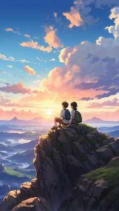 two people sitting on top of a mountain looking at the sunset