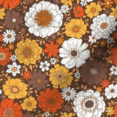 an orange and brown flowered background with white, yellow, and red flowers on it