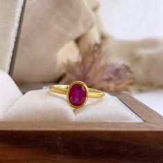 Oval Ruby Rings For Gift, Luxury Ruby Ring With Round Cut Birthstone, Luxury Ruby Rings As Gifts, Oval Ruby Rings Suitable For Gifts, Luxury Ruby Ring As Gift, Luxury Round Cut Ruby Birthstone Ring, Classic Rings With Lab-created Ruby For Gift, Classic Ruby Diamond Ring As Gift, Timeless Red Ring As A Gift