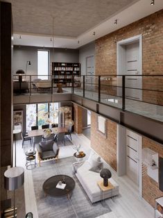 a living room filled with furniture next to a fire place under a loft style ceiling