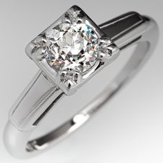 This lovely vintage solitaire engagement ring features a .66 carat old European cut diamond set into a four-prong head. The shoulders of the ring are each bordered with milgrain edging. The ring measures 6.7mm at the top and rises 7.0mm above the finger. The ring is currently a size 6 and we offer complimentary resizing to fit. Classic Gia Certified Platinum Ring, Gia Certified Vintage Ring With Round Band, Classic Solitaire Diamond Ring For Formal Occasions, Vintage Gia Certified Diamond Ring With Round Band, Classic Gia Certified Round Band Ring, Vintage Gia Certified Diamond Ring, Vintage Gia Certified White Diamond Ring, Gia Certified Classic Rings, Classic Single Diamond Ring